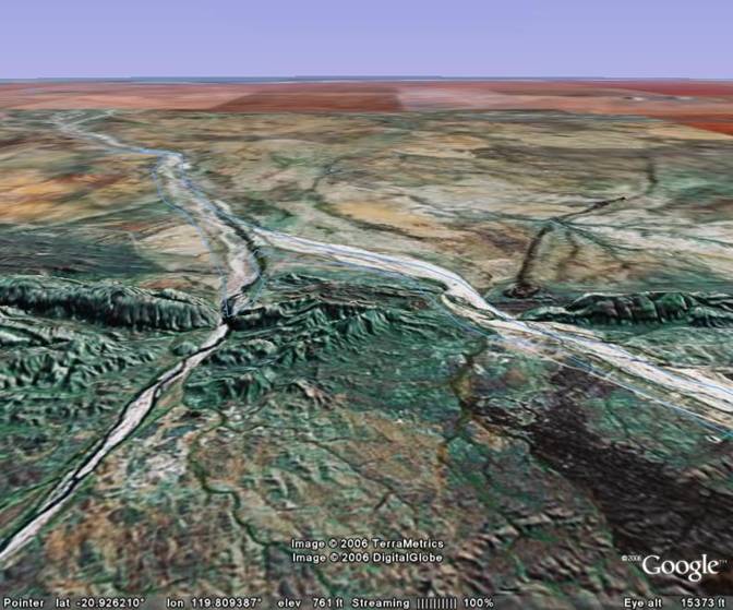 The Coongan River and a tributary cut through a
          ridge in Western Australia.