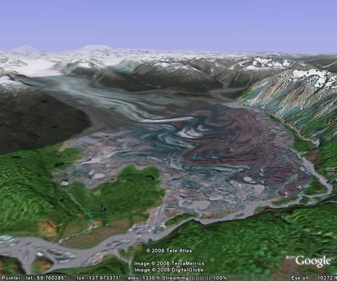 The Tweedsmuir Glacier threatens to block the
          Alsek River.