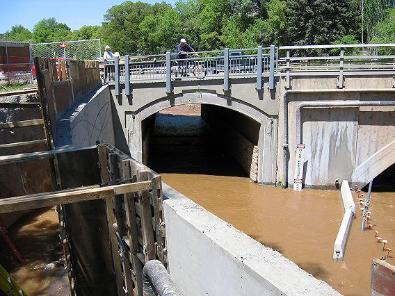 The new tunnel for the Animas River Trail (under
          construction) is flooded.