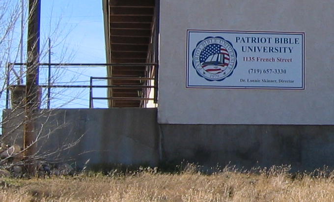 A close-up of the "Patriot Bible
          University" name