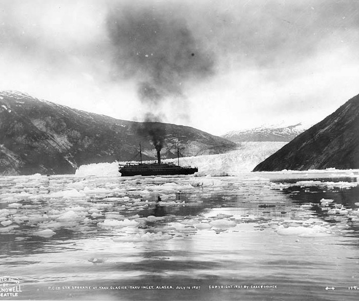 The steamship Spokane in front of the Taku Glacier in
          1907