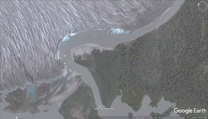 A 2010 Google Earth view of the Taku Glacier next to its
          calving zone on the Norris River.